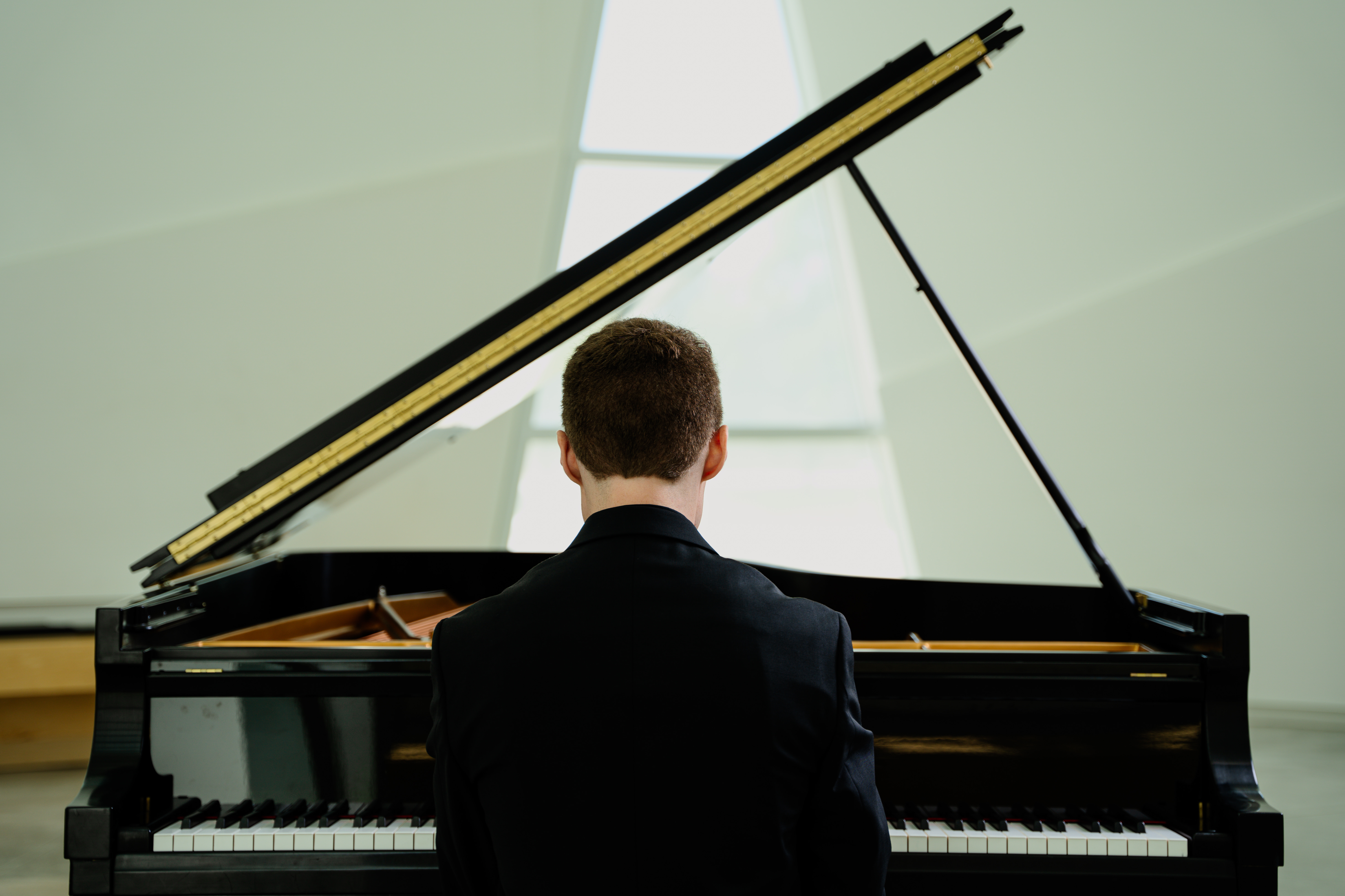 Luke playing piano